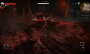 Wiedźmin 3 w cieniu wiecznego ognia. Geralt walczy z Ofiarą zarazy w jaskini, otoczony czerwonym światłem i stalaktytami.