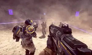Gracze w futurystycznych zbrojach walczą na pustynnym polu bitwy. To jedna z najlepszych gier na PS4, pełna akcji i emocji.