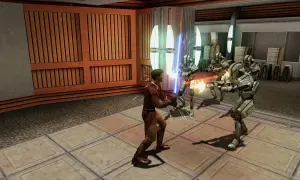 Młody Jedi walczy z droidami bojowymi w jednej z gier Star Wars.
