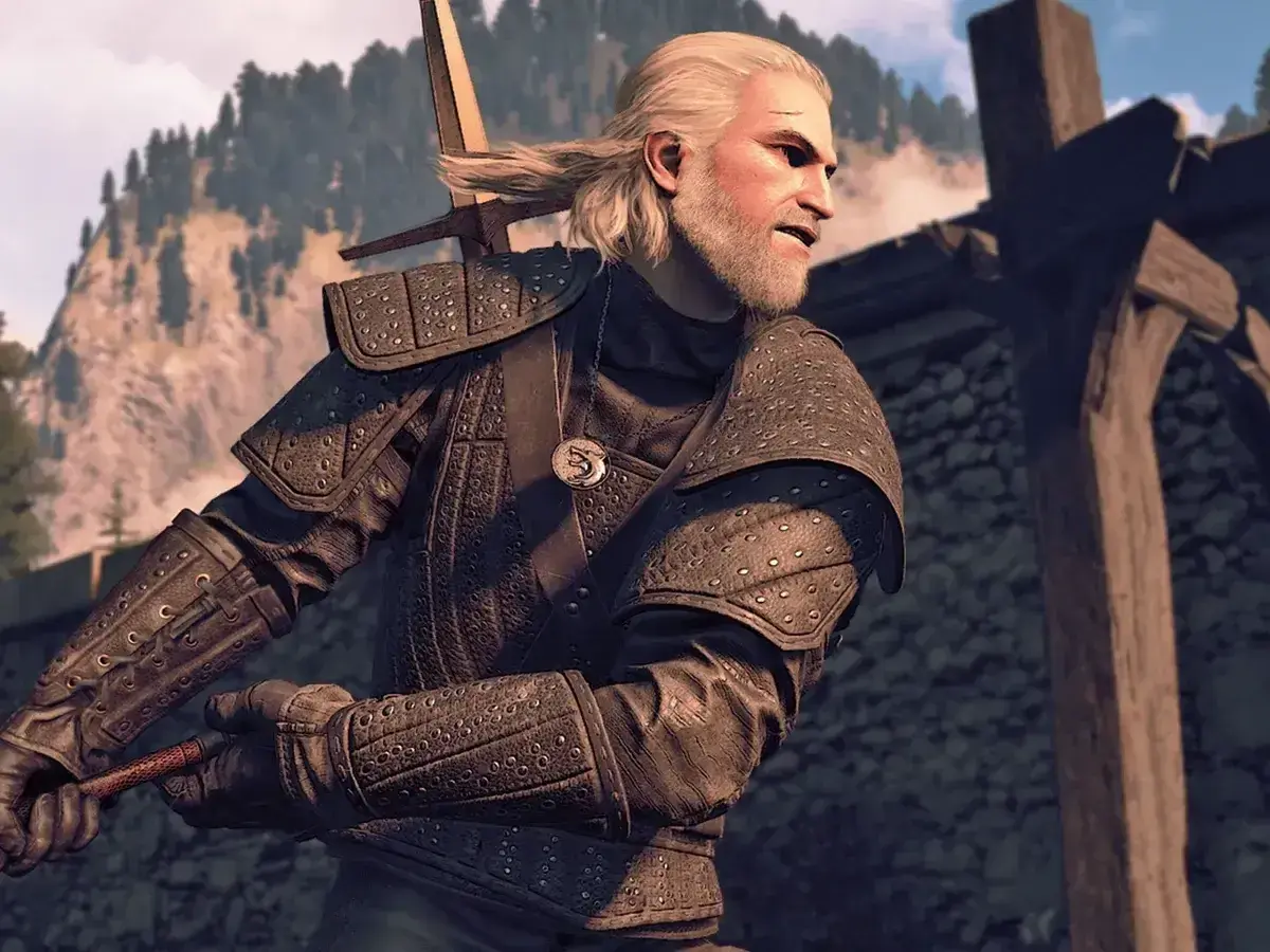 Geralt w skórzanych rynsztunkach z Wiedźmina 3, z mieczem za plecami, gotowy do walki.
